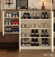 Meuble de rangement pour chaussures incurvé de style crème, de porte au plafond, avec ligne squelettique murale et grande capacité pour l'entrée