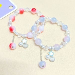 Bracelet extensible pour femme en perles de verre colorées de 10 mm, imitation perle de coquillage, style plage océanique, cadeau - Product Image 1