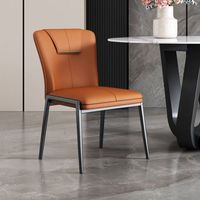 Chaise de salle à manger moderne et robuste avec structure métallique et dossier rembourré en cuir, design nordique décontracté, mobilier de maison