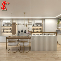 Comptoir de magasin de bijoux en verre moderne avec éclairage LED, solutions d'affichage intérieur personnalisables pour les magasins de bijoux