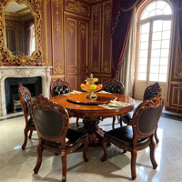 Europäisches Königliches Massivholz Rundes Esszimmer-Set mit Drehplatte Handgeschnitzte Schwarze PU-Leder Stühle Esszimmermöbel Großhandel