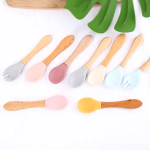 New Arrival BPA-Free Classic Kids Dining Utensils Toddle Eating Tools Silicone Baby Spoon And Fork Set With Wooden Handle