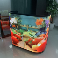 Écran LED incurvé sur roues pour stand DJ 3D, mur vidéo LED P2.5 pour réception, stand portable pour salon professionnel, écran LED de table pour discothèque - Prix usine