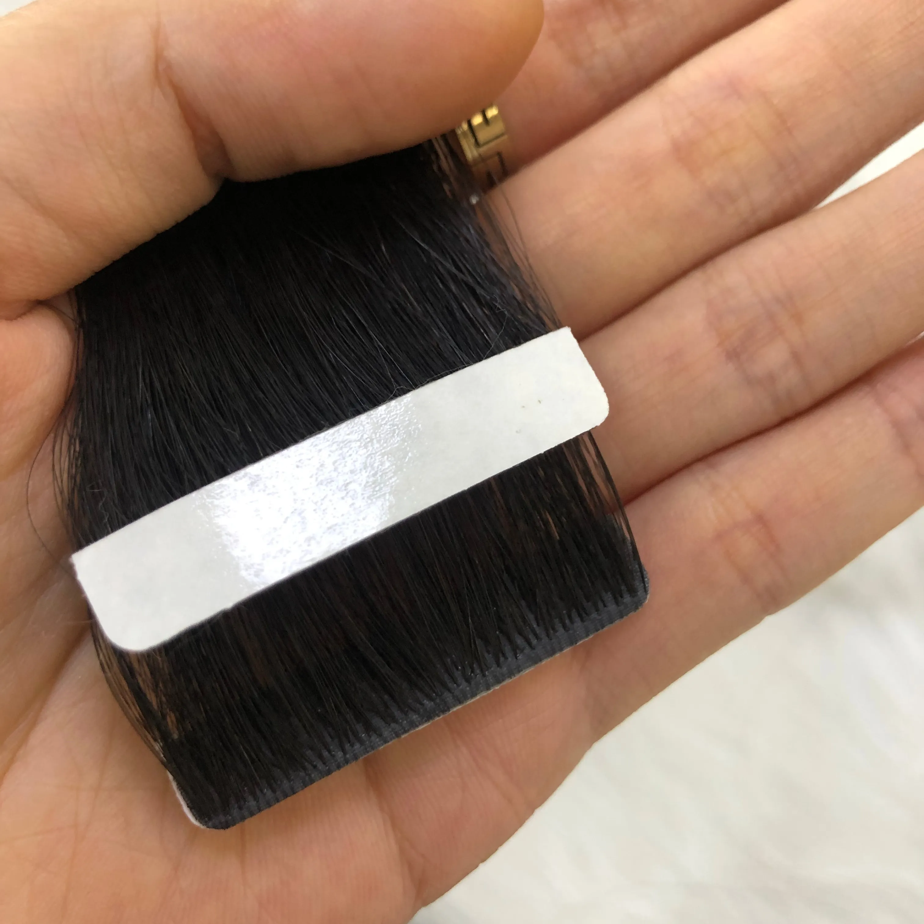 100% natural brazilian remy double drawn hand tied blonde invisible tape in hair extensions human