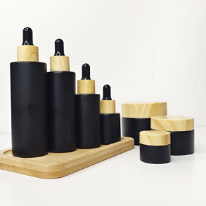 ขวดแก้วใส่เครื่องสำอางสีดำขนาด 30 กรัม แบบกำหนดเองจากโรงงาน สำหรับบรรจุเซรั่มน้ำมันบำรุงเส้นผม ขวดแก้วแบบไหล่เรียบสีด้านพร้อมหัวหยด - Product Image 2