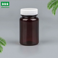 Flacon en plastique transparent vert de qualité pharmaceutique en PET avec bouchon à vis et design sérigraphié