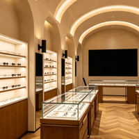 Vitrines d'exposition LED personnalisées pour lunettes, comptoirs de magasin d'optique, stations d'expérience en îlot central de centre commercial et vitrines d'exposition