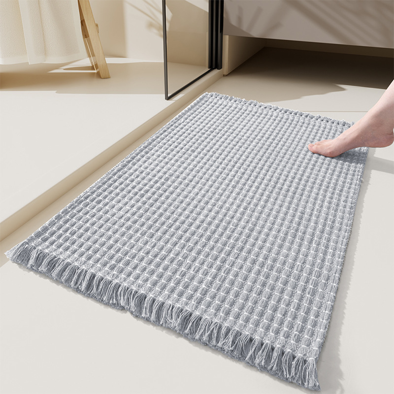Tassel woven bathroom mat - beige