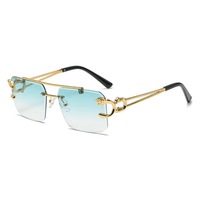2025 pas cher mode Vintage léopard tête Double pont élégant sans monture lunettes de soleil UV400 Protection femmes lunettes de soleil
