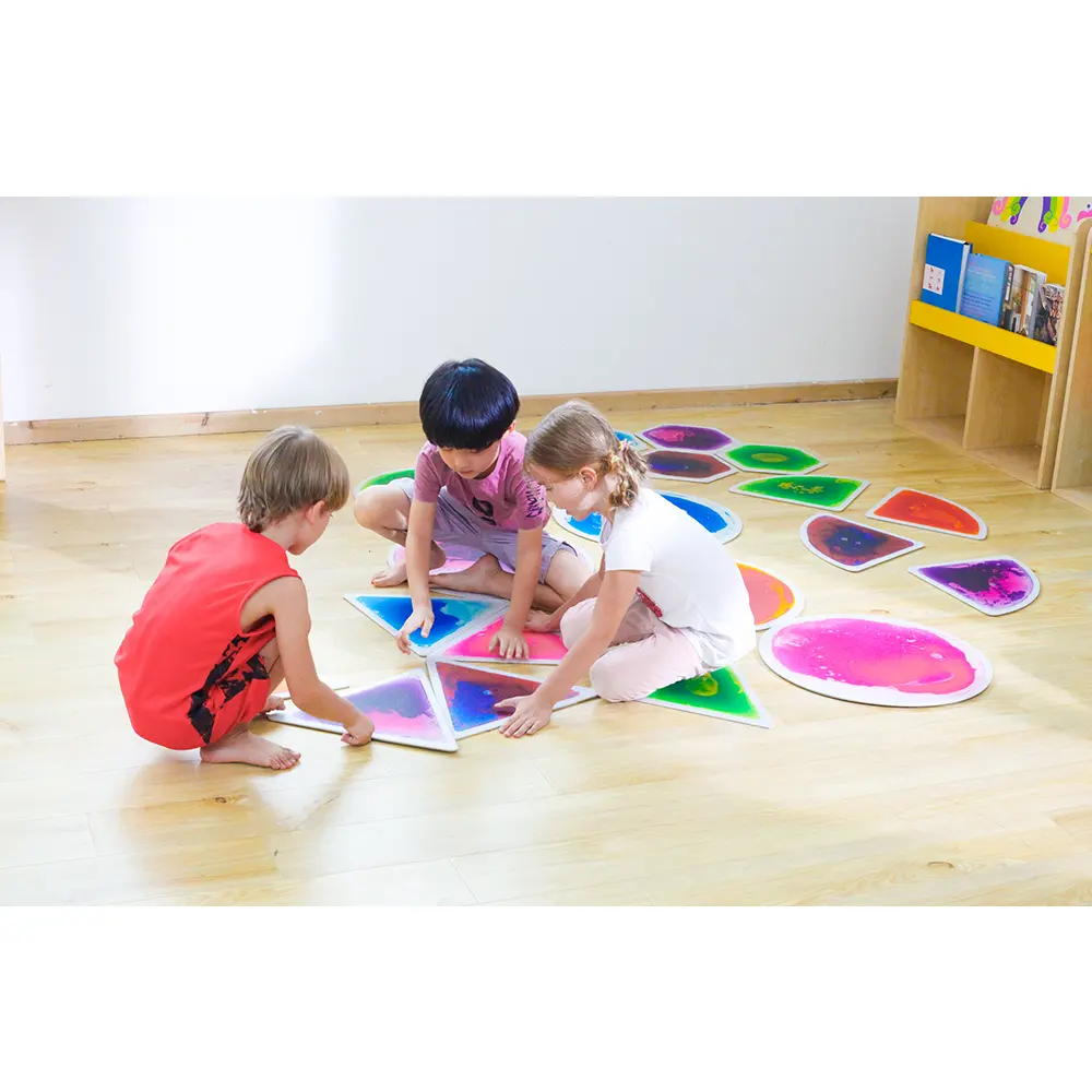 Hot sale 30X30cm colorful vinyl liquid mats kindergarten 3d puzzle shape liquid lava floor kid's playroom sensory pvc flooring