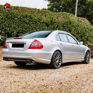 Kit Carrozzeria Completo AMG (Paraurti Anteriore <span class=keywords><strong>e</strong></span> Posteriore, Minigonne Laterali) per <span class=keywords><strong>Mercedes</strong></span> <span class=keywords><strong>Benz</strong></span> Classe <span class=keywords><strong>E</strong></span> W211 - Aggiornamento a E63 - Prezzo di Fabbrica - Product Image 4