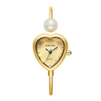 Shenzhen Capstan Jewelry Co., Ltd Source Jewelry Factory Montre à bracelet ouvert en alliage d'or poli miroir avec cadran en cristal en forme de cœur et perle