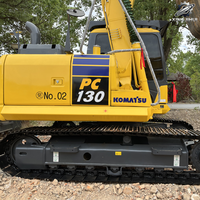 Vente Flash : Excavatrice sur chenilles Komatsu 130 d'occasion, 13 tonnes, système hydraulique complet, bon état, livraison rapide, expédition mondiale