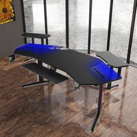 Grand bureau de jeu moderne en fibre de carbone noir RVB avec lumières LED Table d'ordinateur d'angle personnalisée de 1.8m pour le bureau de jeu Gamer