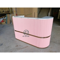 Comptoir de caisse rose haut de gamme de luxe petite entreprise hôtel magasin de vêtements réception salon de manucure réception