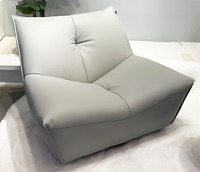 Fauteuil de sol moderne en similicuir PU sans accoudoirs, rembourré en éponge douce, pivotant, résistant à l'eau et facile d'entretien pour salon et chambre à coucher