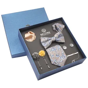 Un Set di nove pezzi di tessuto in Micro-poliestere Jacquard floreale cravatta A battibecco e tasca quadrata gemelli con risvolto
