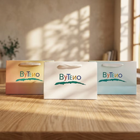 Sacs en papier kraft écologiques recyclables noirs avec poignées en corde de coton pour l'emballage alimentaire et vestimentaire et le shopping