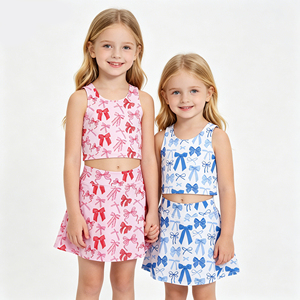 ชุดเทนนิสเด็กผู้หญิงสีชมพูพร้อมโบว์ ชุดเสื้อกล้ามคอกลมแขนกุดเนื้อผ้านุ่มยืดหยุ่นสำหรับเด็ก พร้อมกระโปรงสั้น ชุดออกกำลังกายสองชิ้น - Product Image 1