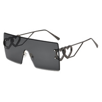Nouvelles Lunettes de Soleil Cœur Sans Monture Tendance 2024 UV400 Femme Style Y2K Populaire Internet Européen Américain Transfrontalier