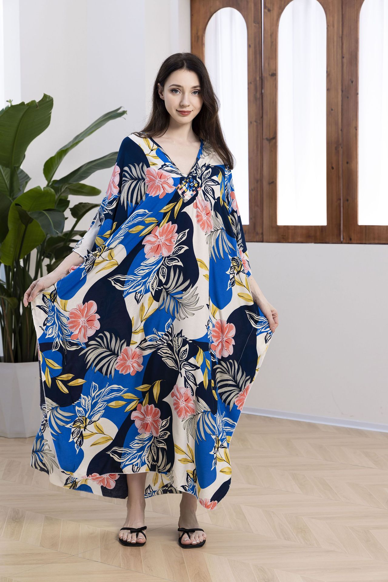 -5 fleurs roses sur fond bleu