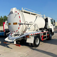 Camion d'aspiration des eaux usées Sinotruk 4x2 10CBM avec pompe à vide et réservoir de 10000L, occasion