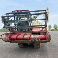 Moissonneuse-batteuse chenillée d'occasion WORLD, 90% neuve, entièrement fonctionnelle avec rapport de test, machine agricole de récolte