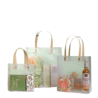 Vente en gros Sac fourre-tout givré Emballage cosmétique transparent en PVC pour la fête des enfants Sacs en plastique de boîte cadeau étanche d'accompagnement