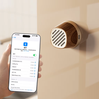 KUANGXIANG Haut-parleur portable ultra-compact 4 en 1 avec interconnexion TWS Support de téléphone de charge USB Couleur bois