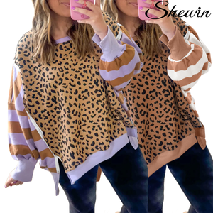 <span class=keywords><strong>Felpa</strong></span> da Donna Shewin Autunno Inverno 2025 a Righe con Collo Tondo Traspirante e Confortevole con Stampa <span class=keywords><strong>Leopardata</strong></span> e Inserti Colorati con Spacchi Laterali - Product Image 1