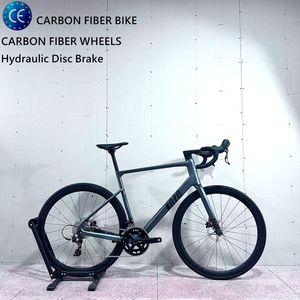 Vélo de route aérodynamique en fibre de carbone KOZO, vente en gros directe d'usine, 700C, frein à <span class=keywords><strong>disque</strong></span> hydraulique Sensah 24S, vélo de course léger, OEM - Product Image 1