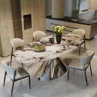 Table à manger ovale en pierre frittée avec 4 chaises et pieds robustes en acier au carbone pour hôtel, villa, maison et restaurant, usage quotidien