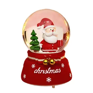 Wholesale rotating resin snow globe Christmas snowball music box snowflake snow globes decorative crafts