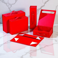 Boîte d'emballage magnétique pliable de luxe couleur orange avec poignée en cuir PU, matériaux recyclés, pelliculage mat, haut de gamme