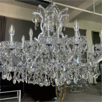 Lustres en cristal transparents à cadre argenté luxueux personnalisés Saixin pour la décoration de plafond d'événements