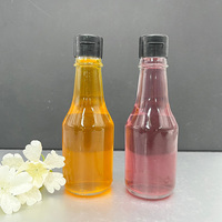 Bouteille en verre transparente de qualité alimentaire de 150 ml avec couvercle à clapet en plastique pour confiture, vinaigrette, ketchup, sauce chili