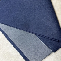 Tissu denim extensible bleu indigo 320 GSM, tissage coton polyester cellulose régénérée élasthanne pour la fabrication de jeans en usine