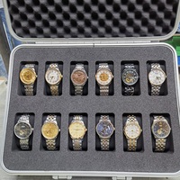 Boîtes de rangement pour montres en aluminium, étanches, antichoc, avec mousse imperméable personnalisée, renforts métalliques, fermeture à cadenas, logo personnalisé.