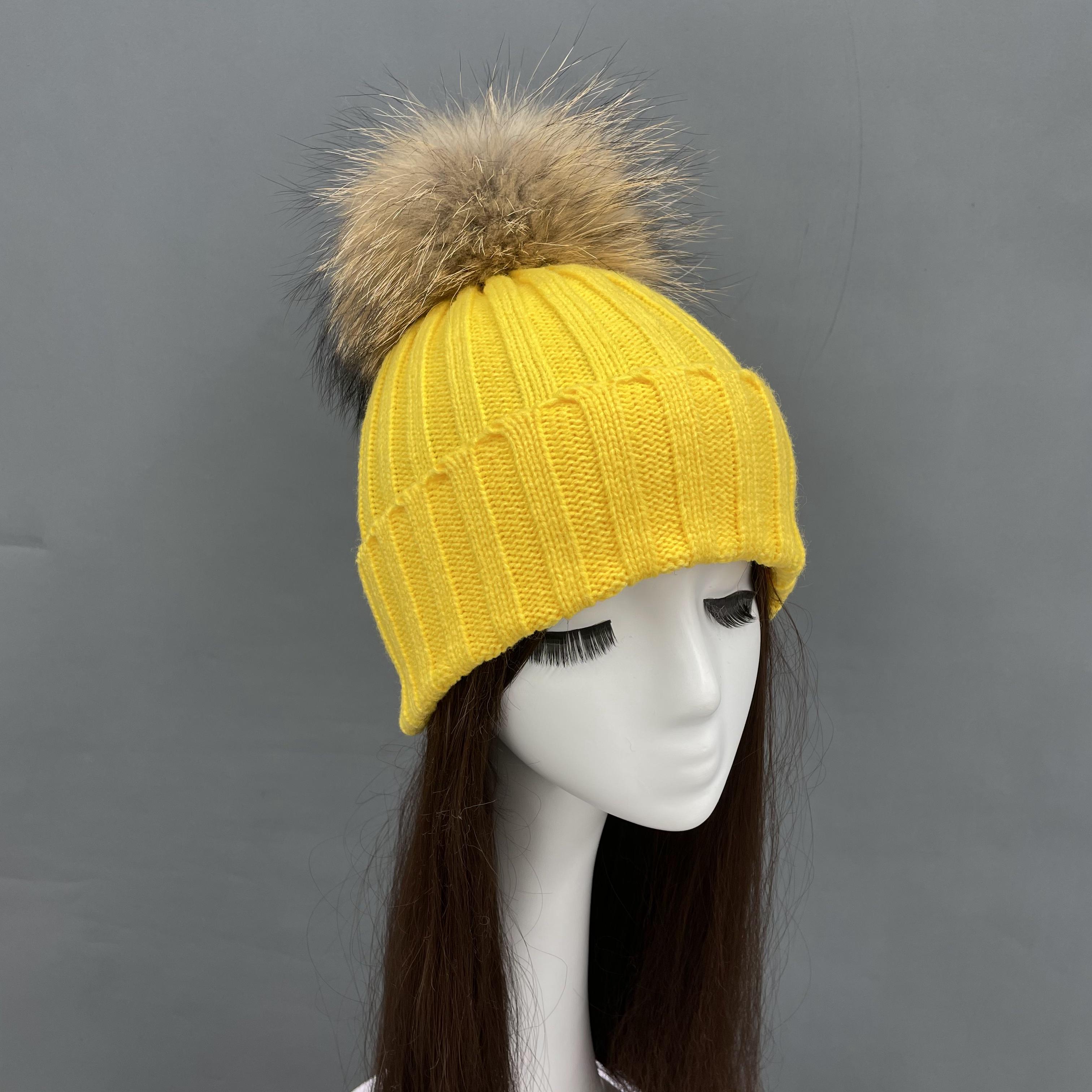 Yellow knitted beanie hat