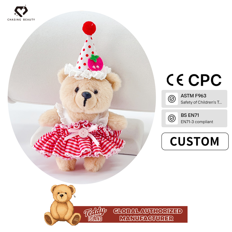 Oso de peluche con vestido rosa palo