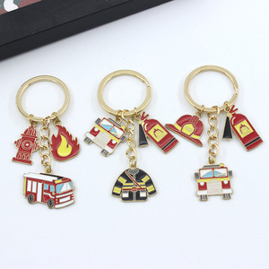Lot de porte-clés à thème <span class=keywords><strong>pompier</strong></span> : <span class=keywords><strong>camion</strong></span> de pompiers, hydrant, combinaison de <span class=keywords><strong>pompier</strong></span>, extincteur – Promotion sécurité incendie - Product Image 1