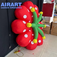 Fleur gonflable décorative d'extérieur à pois rouges, sculpture florale gonflable personnalisée avec logo pour la décoration de fond de scène événementielle