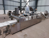 Machine industrielle entièrement automatique de type horizontal en acier inoxydable pour la production de barres protéinées, ligne de production de barres énergétiques pour la fabrication de nougat
