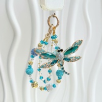 Breloque de téléphone perlée fleur bleue, cordon de poignet double couche pour téléphone, perles imitation nacre, porte-clés fait main, pendentif de sac, décoration