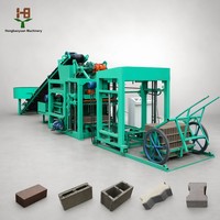 Prix de la machine à briques de ciment automatique pour la fabrication de blocs de béton autobloquants QT4-25