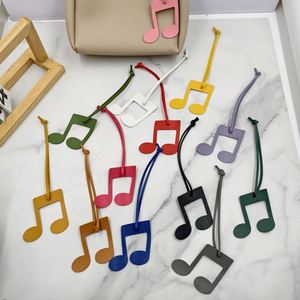 Porte-clés créatif en cuir PU avec breloque musicale, motif note de musique mignon, design léger, accessoire de sac avec sangle de suspension - Product Image 3
