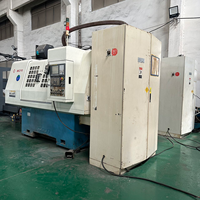 Máquina rectificadora interna CNC MK2110 de la Fábrica de Máquinas Herramienta No. 1 de Wuxi para rectificado preciso de orificios y casquillos internos.