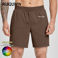 Shorts de sport pour hommes RUIQUWIN avec logo personnalisé, solides, pour l'été, OEM, grande taille, séchage rapide, évacuation de l'humidité, pour la randonnée et les voyages