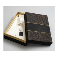 Boîte d'emballage de luxe personnalisée haut de gamme, étanche, avec couvercle et base, et doublure en éponge pour vêtements, sweats à capuche et marques.
