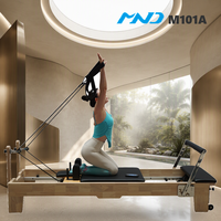 Matériel de fitness professionnel MND : Lit de Pilates Reformer en bois d'hévéa commercial pour la rééducation